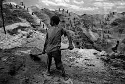 child worker in open pit mine